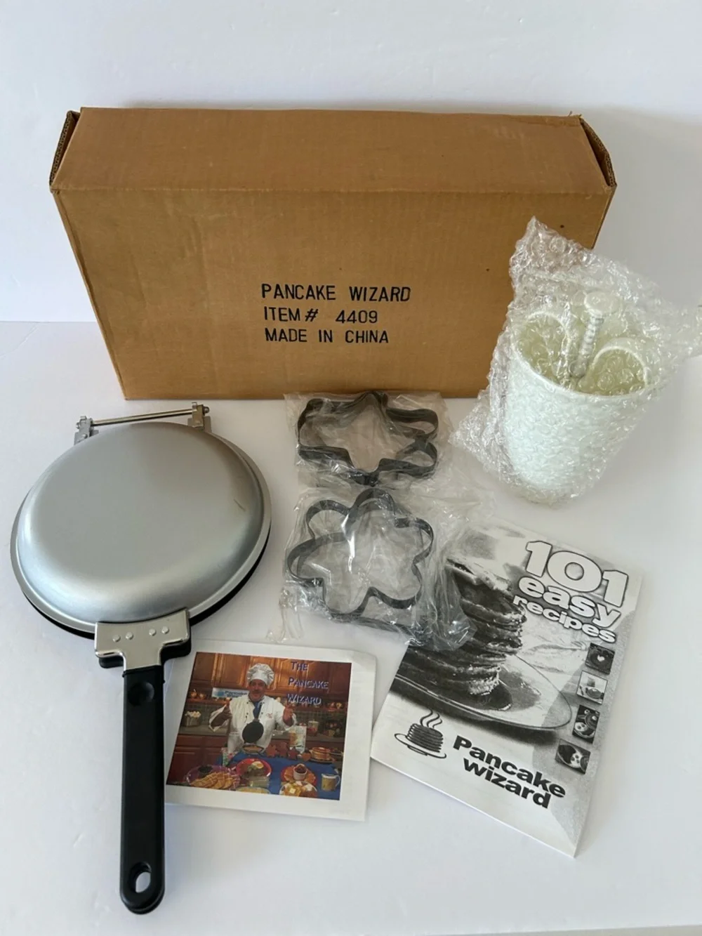 VTG “Pancake Wizard” Set includes: Pan, Batter Dispenser, Booklet, and 4 Shapes